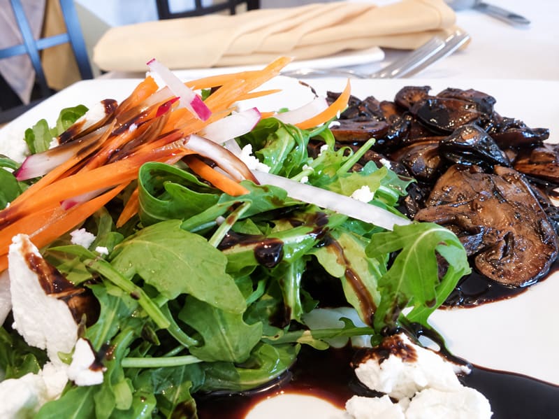 Greens with shaved carrot and radish, dark mushrooms, goat cheese and balsamic